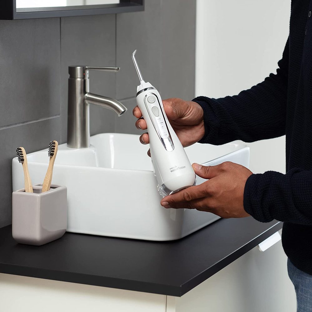 Waterpik Cordless Advanced Water Flosser For Teeth, Gums, Braces, Dental Care With Travel Bag and 4 Tips, ADA Accepted, Rechargeable, Portable, and Waterproof, White WP-560 - Image 3